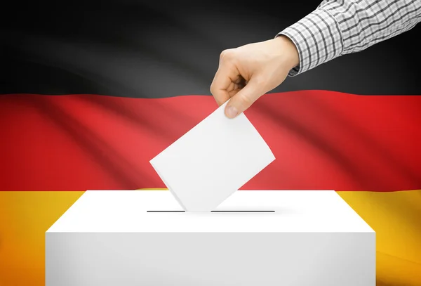 Voting concept - Ballot box with national flag on background - Germany