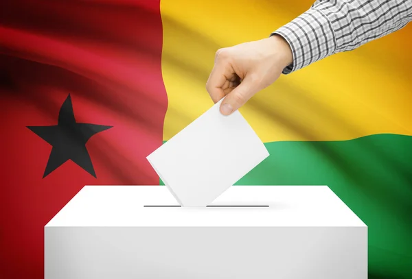 Voting concept - Ballot box with national flag on background - Guinea-Bissau — Stock Photo, Image
