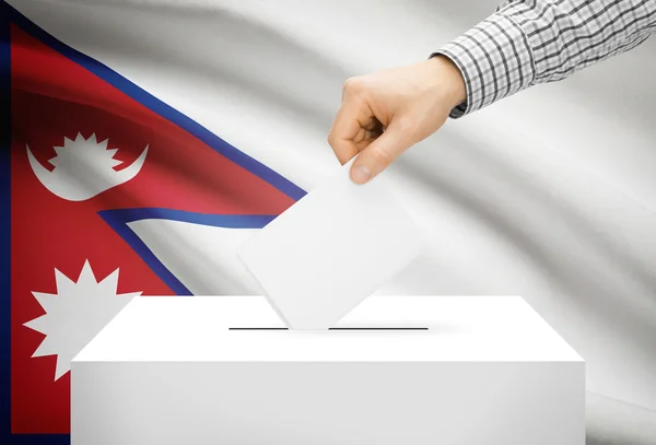 Voting concept - Ballot box with national flag on background - Nepal — Stock Photo, Image