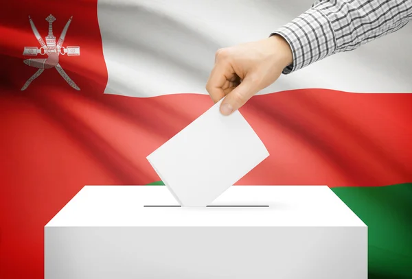 Voto concetto - urna con la bandiera nazionale su priorità bassa - Oman — Foto Stock
