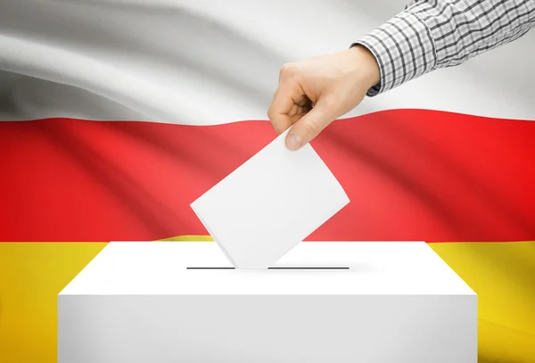 Stemmen concept - stembus met nationale vlag op achtergrond - Zuid-Ossetië — Stockfoto