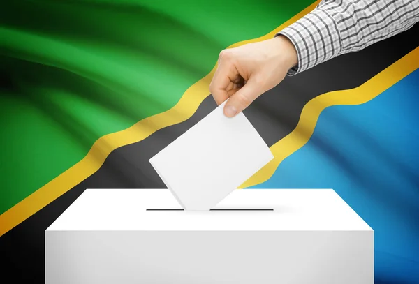 Voto concepto - urna con la bandera nacional de fondo - Tanzania —  Fotos de Stock