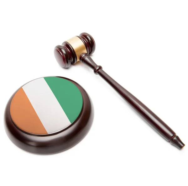 Judge gavel and soundboard with national flag on it - Republic of Cote d'Ivoire - Ivory Coast — Stock Photo, Image