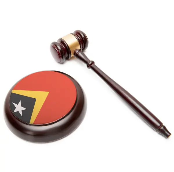 Judge gavel and soundboard with national flag on it - East Timor — Stock Photo, Image