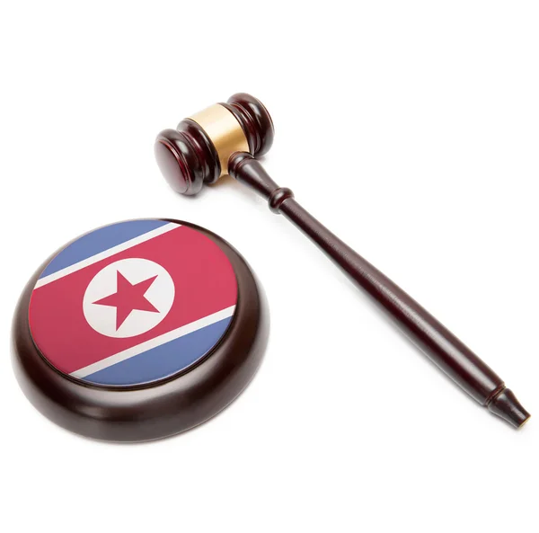 Judge gavel and soundboard with national flag on it - North Korea — Stock Photo, Image