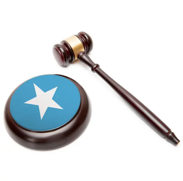 Judge gavel and soundboard with national flag on it - Somalia — Stock Photo, Image