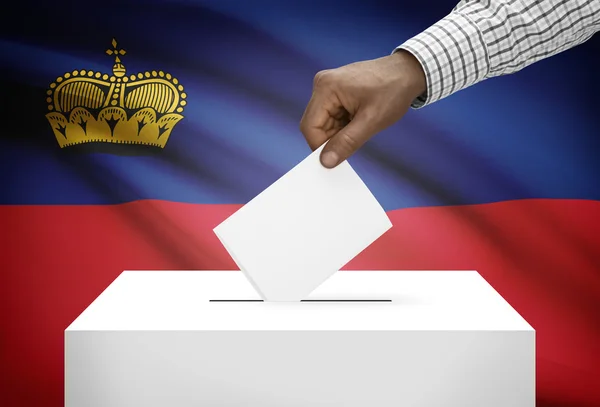 A háttér - Liechtenstein nemzeti zászló a szavazóurnákhoz — Stock Fotó