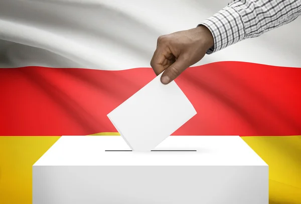 Ballot box with national flag on background - Republic of South Ossetia — Stock Photo, Image