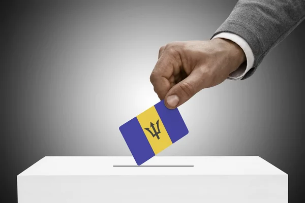 Black male holding flag. Voting concept - Barbados — Stock Photo, Image