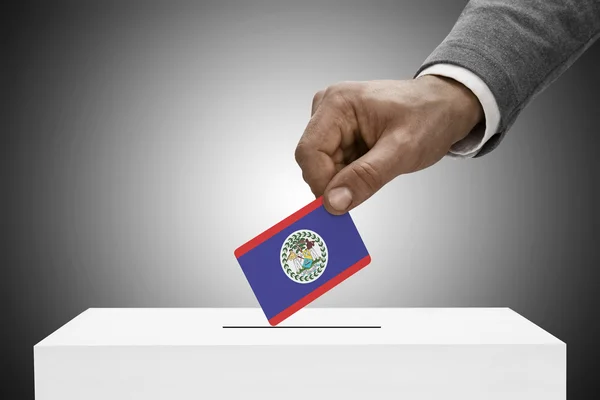 Black male holding flag. Voting concept - Belize — Stock Photo, Image