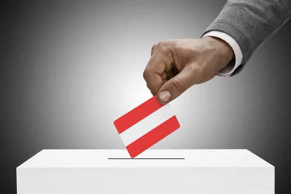 Schwarz männlich mit Flagge. Abstimmung von Konzept - Österreich — Stockfoto