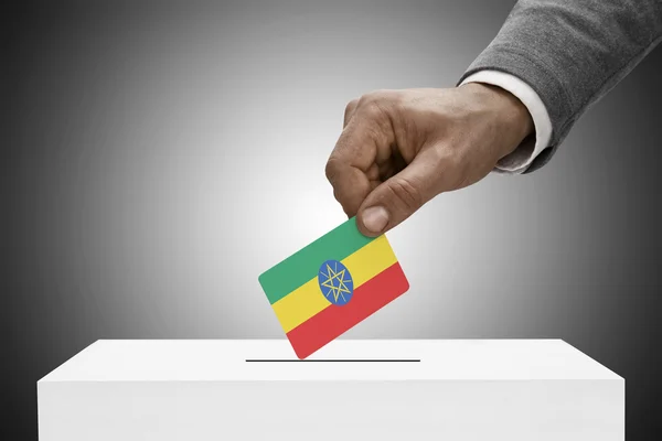 Black male holding flag. Voting concept - Ethiopia — Stock Photo, Image