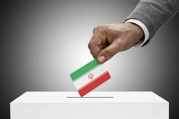 Black male holding flag. Voting concept - Iran — kuvapankkivalokuva