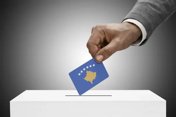 Black male holding flag. Voting concept - Kosovo — Stock Photo, Image