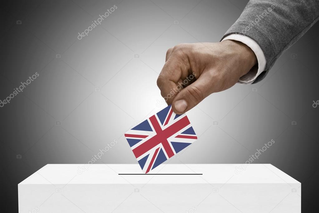 Black male holding flag. Voting concept - United Kingdom