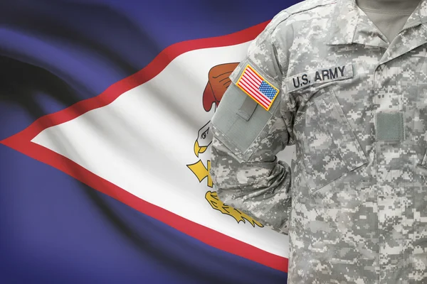 American soldier with flag on background - American Samoa — Stock Photo, Image