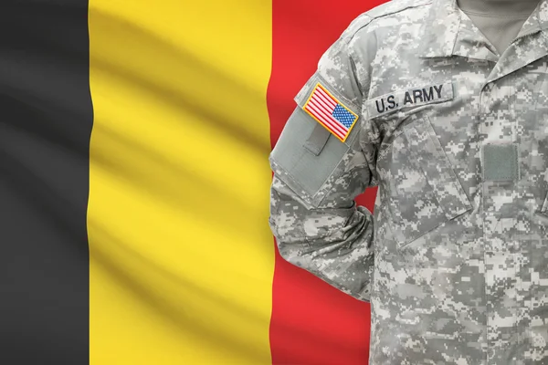 American soldier with flag on background - Belgium — Stock Photo, Image