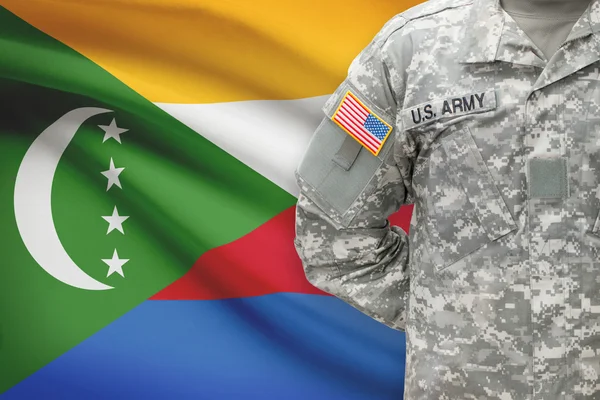 Amerikaanse soldaat met vlag op achtergrond - Comoren — Stockfoto