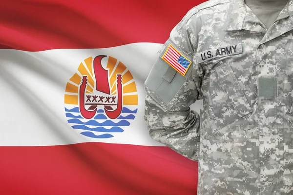 American soldier with flag on background - French Polynesia — Stock Photo, Image