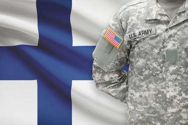 American soldier with flag on background - Finland — Stock Photo, Image