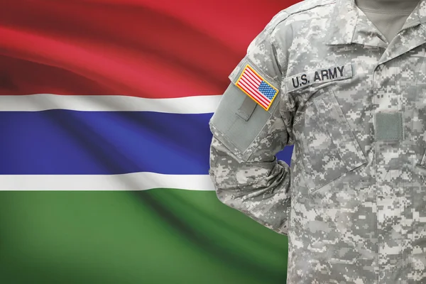 American soldier with flag on background - Gambia — Stock Photo, Image