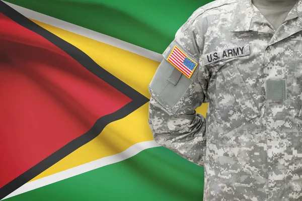 Amerikaanse soldaat met vlag op achtergrond - Guyana — Stockfoto