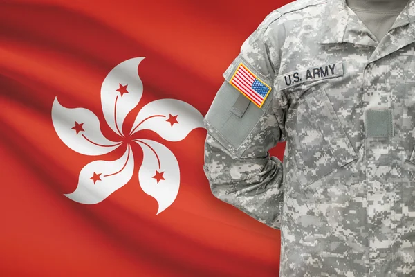 American soldier with flag on background - Hong Kong — Stock Photo, Image