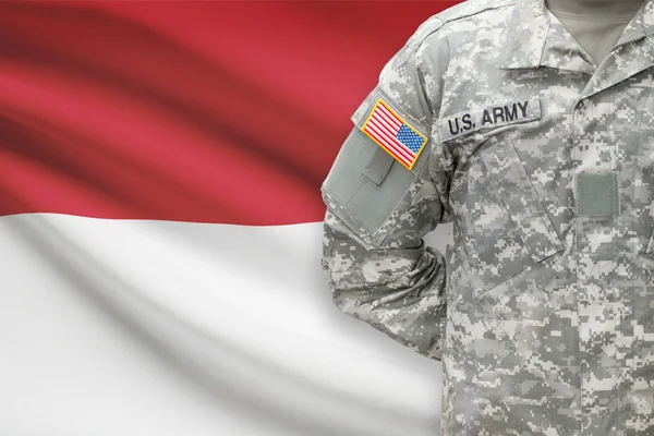 Soldado americano con bandera sobre fondo - Indonesia —  Fotos de Stock