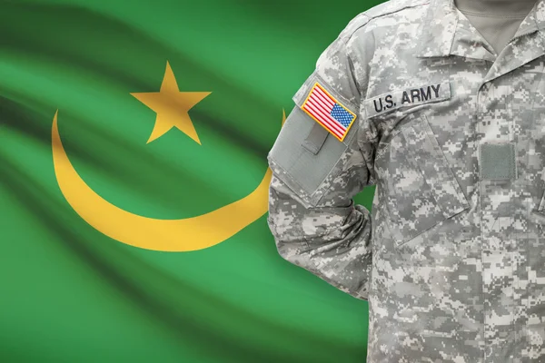 American soldier with flag on background - Mauritania — Stock Photo, Image