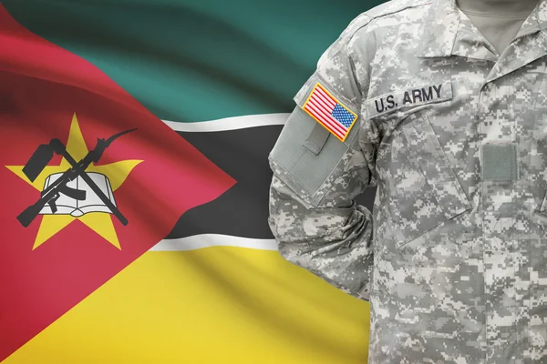 American soldier with flag on background - Mozambique — Stock Photo, Image