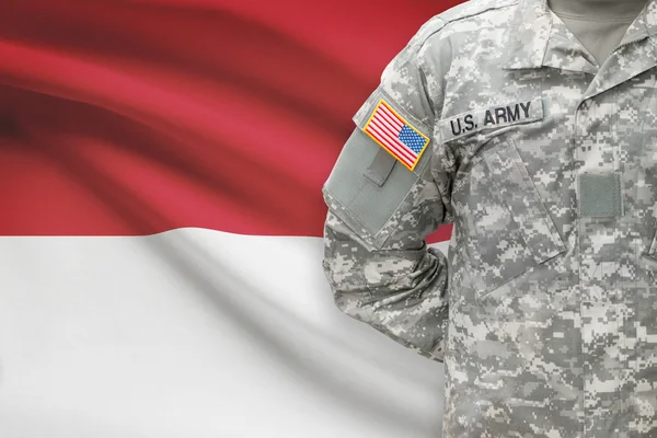 Amerikaanse soldaat met vlag op achtergrond - Monaco — Stockfoto