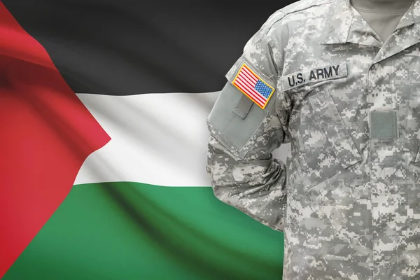 American soldier with flag on background - Palestine — Stock Photo, Image