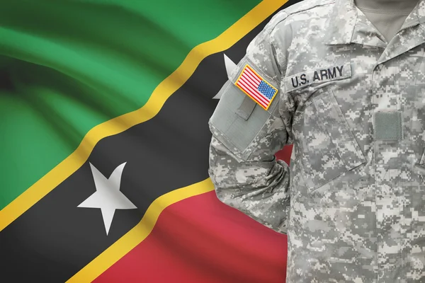 Americký voják s vlajkou na pozadí - Svatý Kryštof a Nevis — Stock fotografie