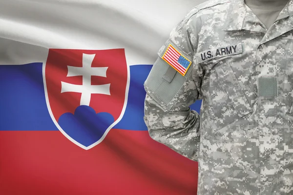 American soldier with flag on background - Slovakia — Stock Photo, Image