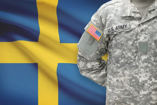 American soldier with flag on background - Sweden — Stock Photo, Image