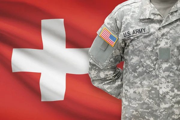 American soldier with flag on background - Switzerland — Stok Foto
