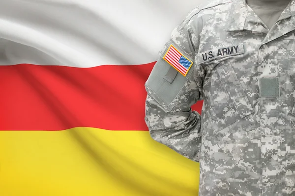 American soldier with flag on background - South Ossetia — Stock Photo, Image