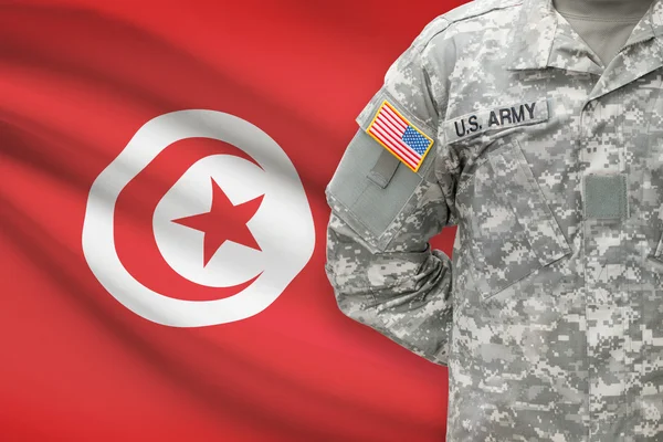 American soldier with flag on background - Tunisia — Stock Photo, Image