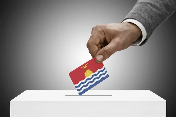 Black male holding flag. Voting concept - Kiribati — Stock Photo, Image