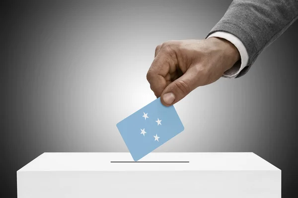Black male holding flag. Voting concept - Federated States of Micronesia — Stock Photo, Image