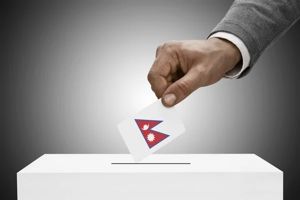 Black male holding flag. Voting concept - Nepal — Stock Photo, Image
