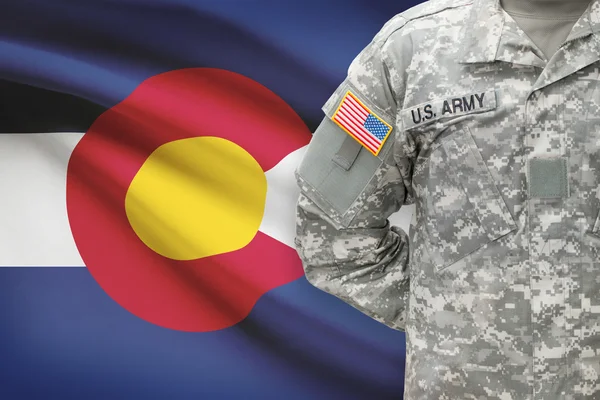 American soldier with US state flag on background - Colorado — Stock Photo, Image