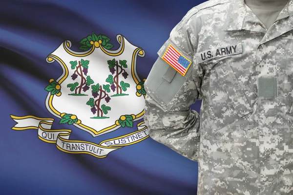 American soldier with US state flag on background - Connecticut — Stock Photo, Image