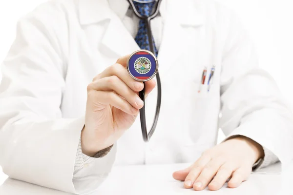 Doctor holding stethoscope with flag series - Belize — Stock Photo, Image