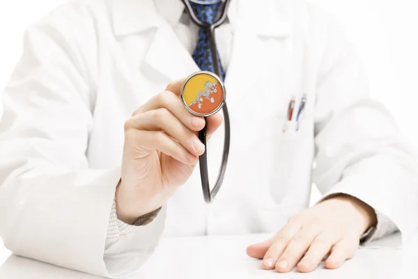 Doctor holding estetoscopio con serie de bandera - Bhután —  Fotos de Stock