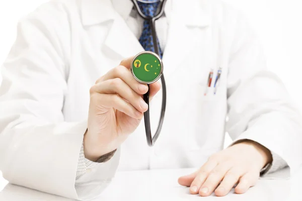 Doctor holding stethoscope with flag series - Cocos (Keeling) Islands — Stock Photo, Image