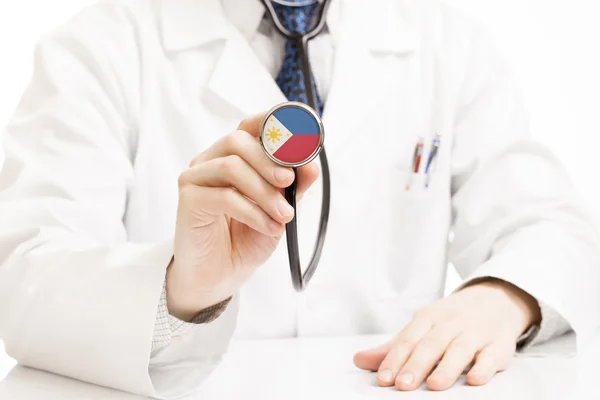 Doctor holding stethoscope with flag series - Philippines — Stock Photo, Image