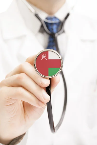Flaga narodowa na stetoskop koncepcyjny serii - Oman — Zdjęcie stockowe