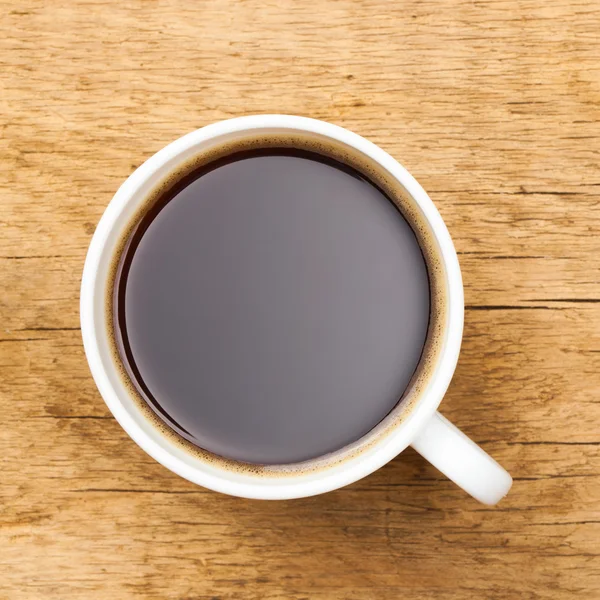 Black coffee in white ceramic cup — Stock Photo, Image