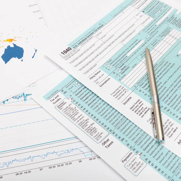 US 1040 Tax Form with ball pen over it — Stock Photo, Image